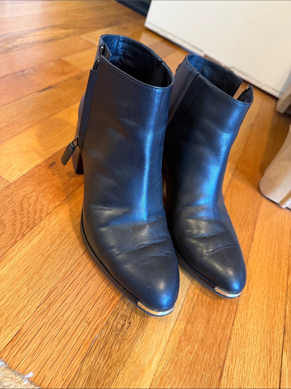 Cole Haan Black Leather Pointed Toe Ankle Boots with Metallic Toe Accent